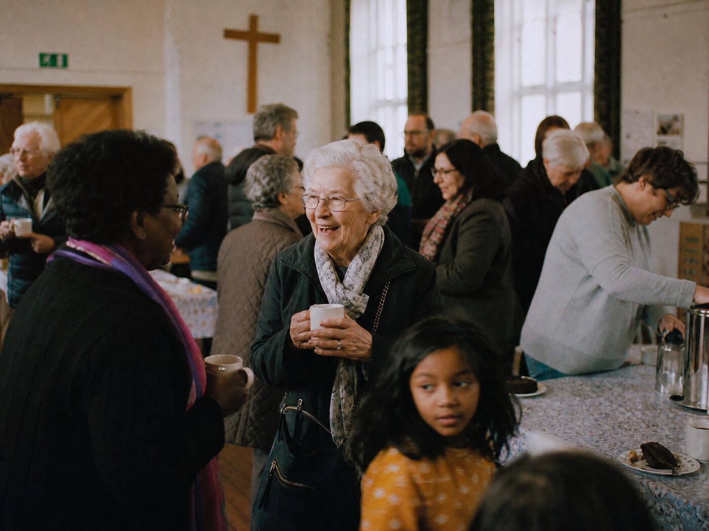 Members of a congregation gathered after a service